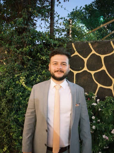 Murat E.